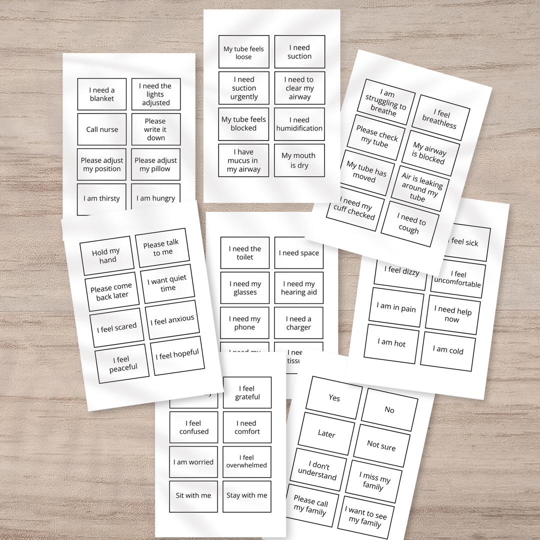 Set of printed communication cards  on a wooden surface