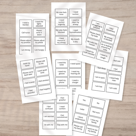 Set of printed communication cards  on a wooden surface