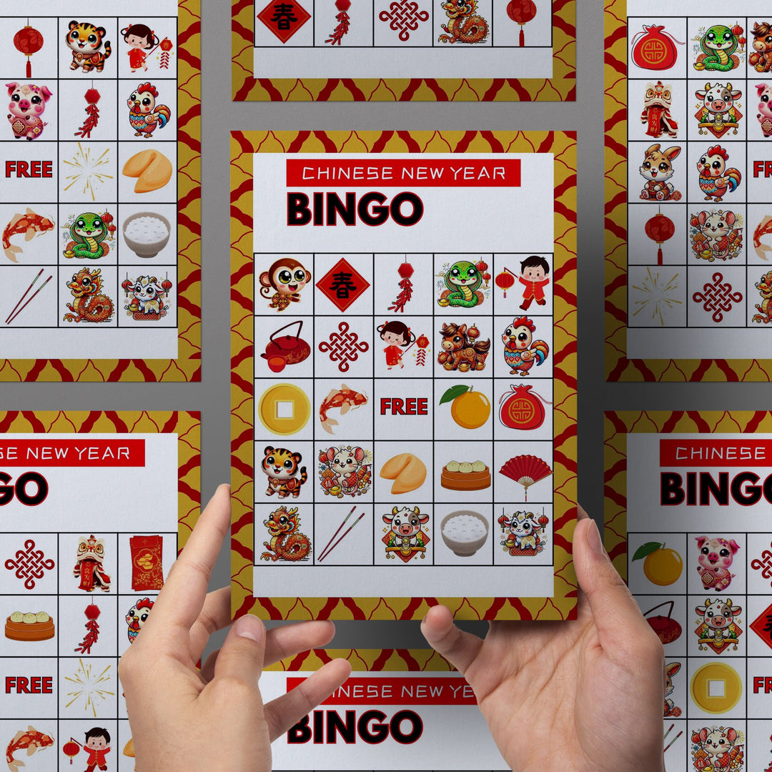 two hands holding the bingo cards