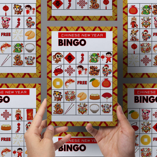 two hands holding the bingo cards