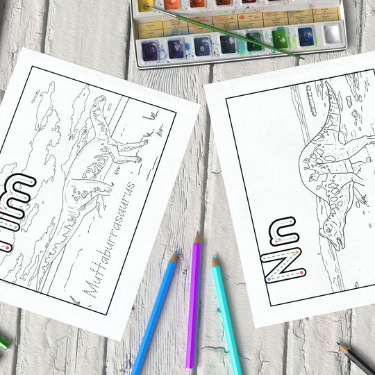 Educational worksheets on a desk with colored pencils and paints