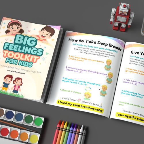 Big Feelings Toolkit for Kids (Ages 5–7) with coloring materials on a dark surface