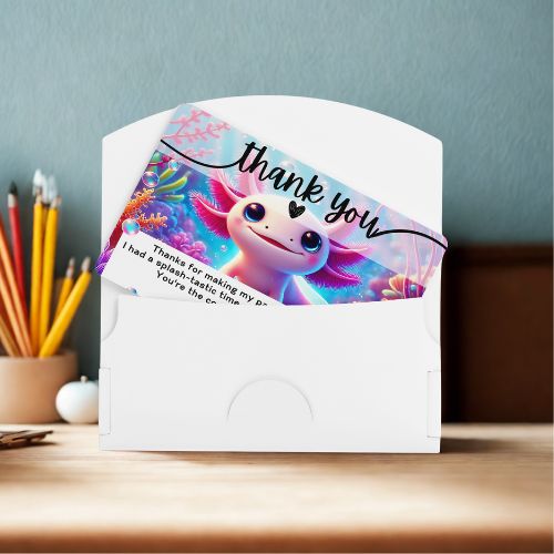 Editable Axolotl Birthday Thank You Card with a cartoon character and 'thank you' message on a white envelope against a blue wall.
