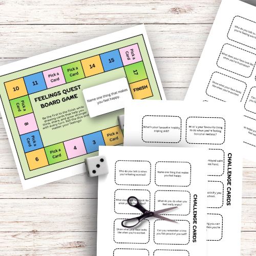Feelings Printable Board Game for Kids  with cards and dice on a wooden surface