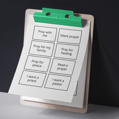 Clipboard with prayer cards on a dark background